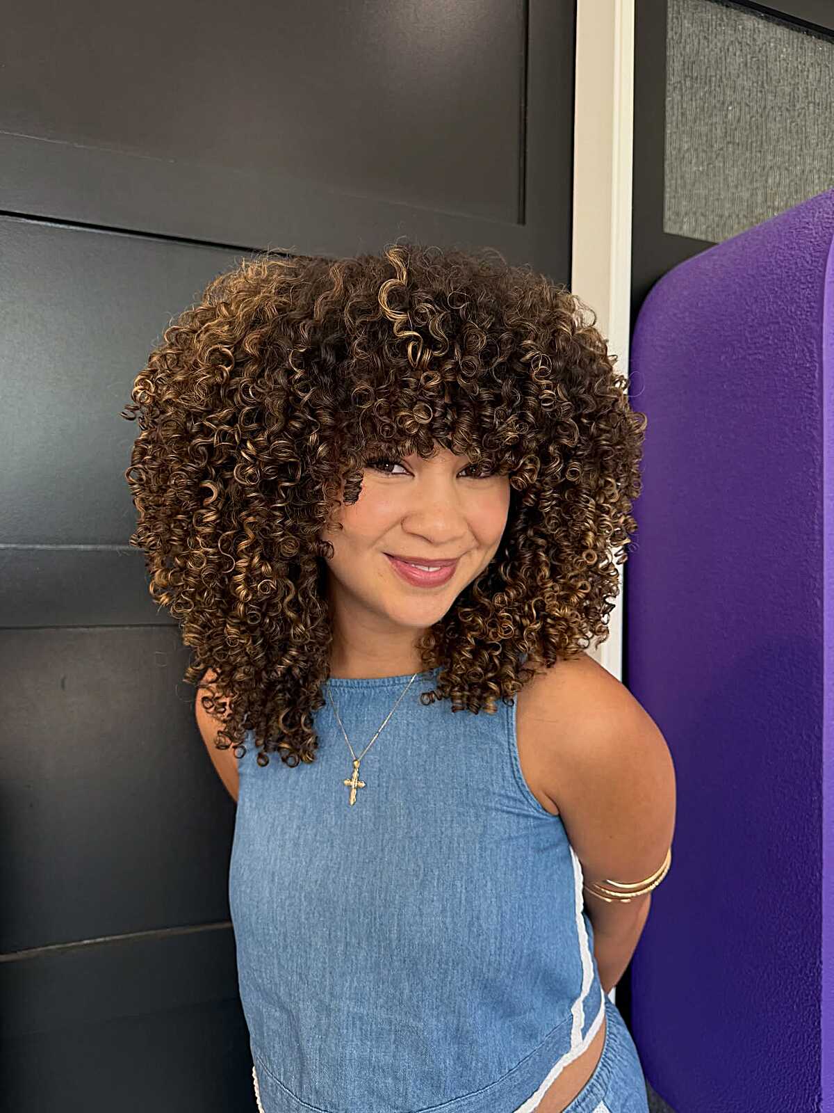 Bold Curls with a Playful Fringe
